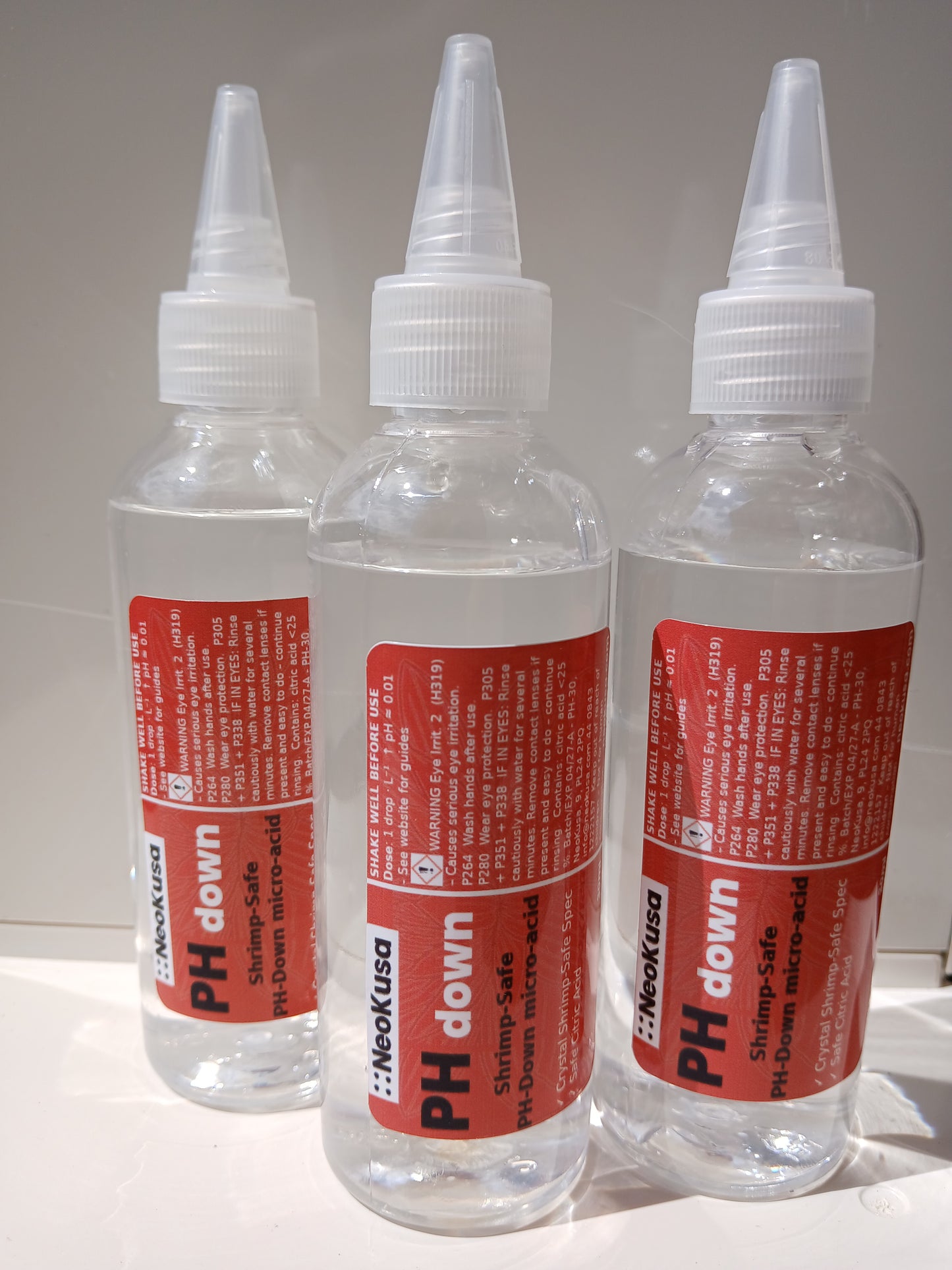 NeoKusa pH‑Down dosing dropper on white